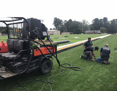 Kansas Turf team finishing a job with ProFlex G5135